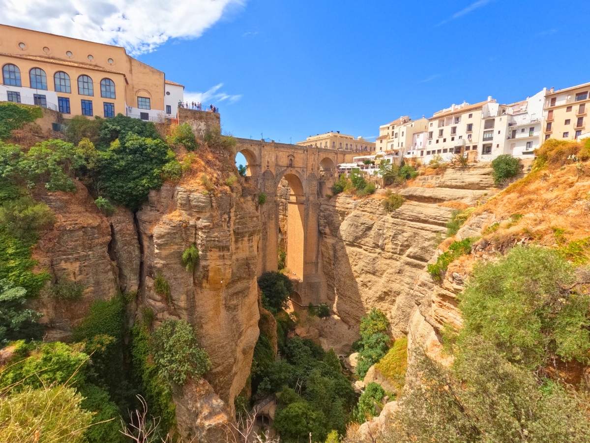 Dramatic cliffside view of Puente Nuevo bridge in Ronda Spain