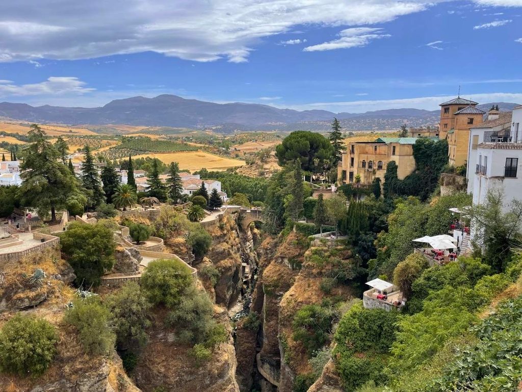 View across El Tajo gorge toward the countryside and mountains surrounding Ronda